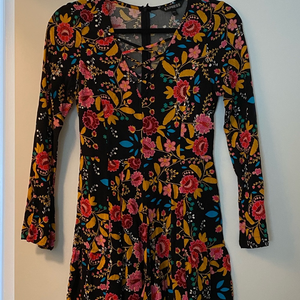 Express Long Sleeve Romper with Vibrant Floral Design